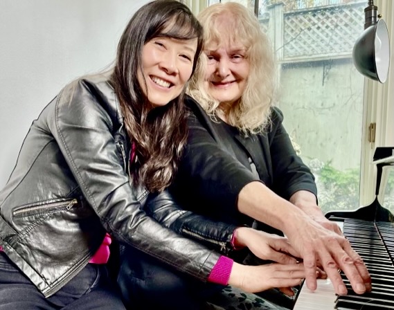 Christina and composer Alice Ping Yee Ho having fun after a rehearsal