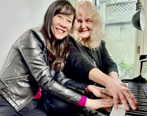 Christina and composer Alice Ping Yee Ho having fun after a rehearsal